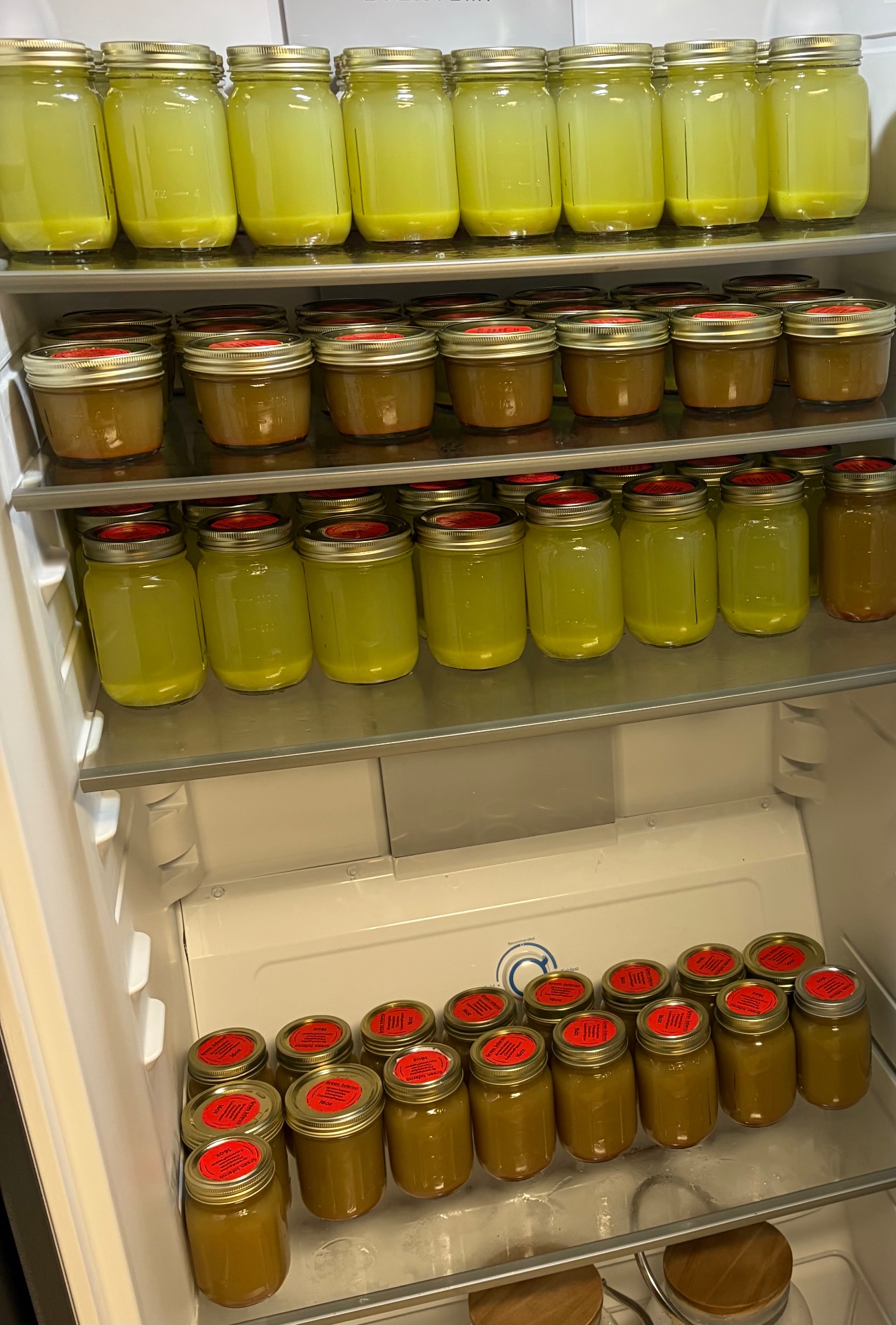 Rows of cold-pressed juice jars ready for a cleanse